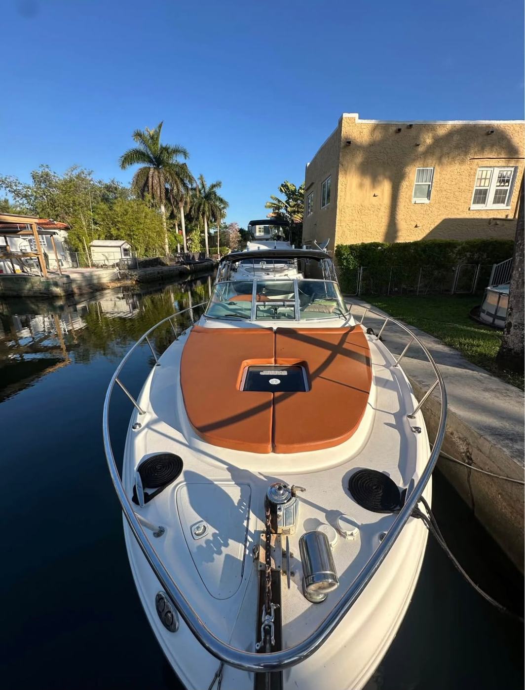 Bow on at the dock, the sunpad cover in place